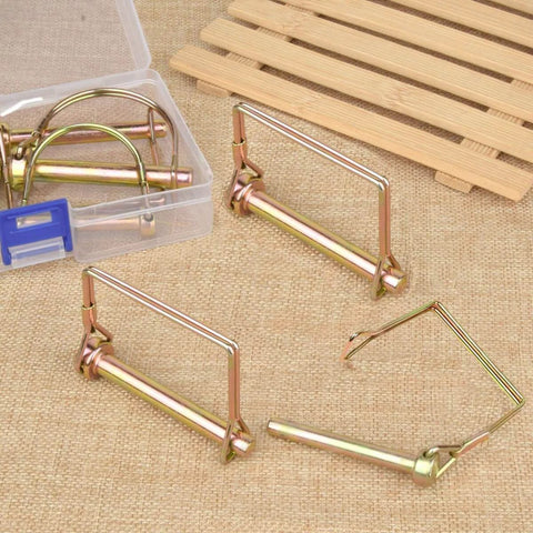 10 Pack Quarter Inch Trailer Hitch Pin Set With Quick Release And Locking Pin for towing coupler displayed on a burlap surface