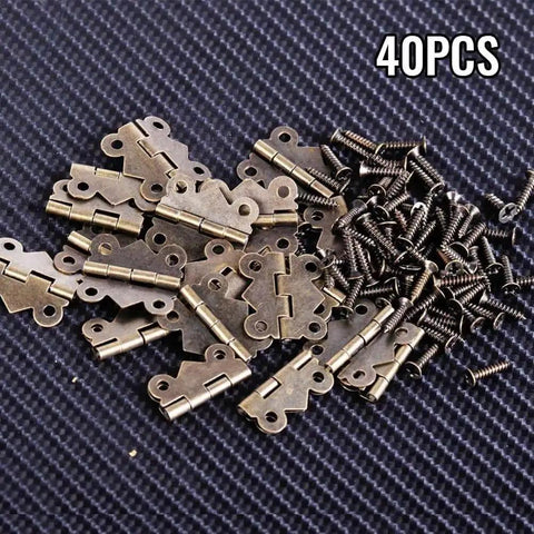 40 Pieces Antique Bronze Butterfly Hinges For Tiny Jewelry Boxes, Dollhouse Cabinets, And Miniature Woodworking Projects, 20 By 17 Mm Iron Hinges With Rust Resistant Plating And Included Screws shown with screws on textured surface.