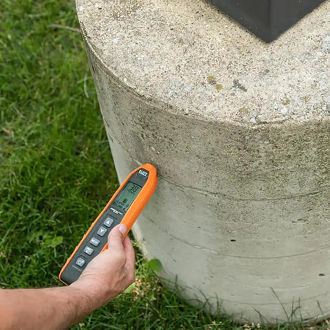 Advanced Underground Circuit Breaker Finder And Wire Tracer Kit in use on cement block, showcasing adjustable sensitivity for wall tracing