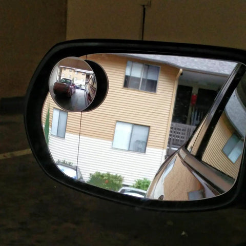 Blind Spot Mirror Set For Cars 2 Inch Round HD Glass Frameless Convex Rear View Mirrors Pack Of 2 Ampper installed in a car's side mirror.