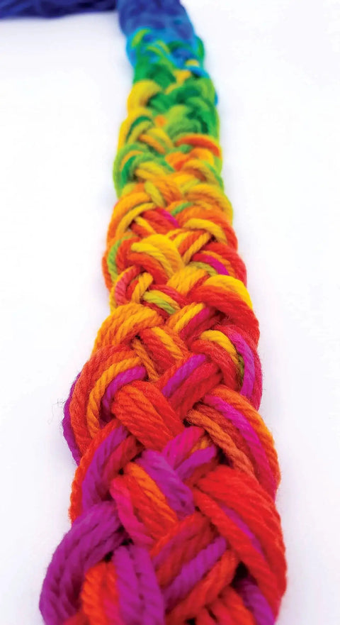 Close-up of braided yarn dyed with Jet Black Acid Dye For Wool Silk Feathers And Nylons 8 oz Net Weight Jacquard Ultra Concentrated Colorfast Dye.