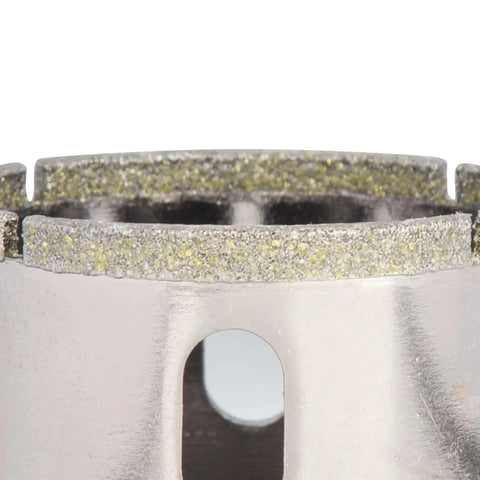 Close-up of Three Quarters Inch Diamond Hole Saw For Tile And Glass Drilling With Guiding Drill Bit Pro Grade For Ceramic Porcelain Marble Granite Quartz Countertops And More High Precision Electroplated Diamond Tool showing the electroplated diamond edge.