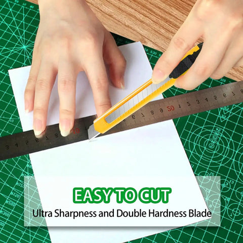 Person using 4 Pack 9mm Snap Off Box Cutter Retractable Utility Knife For Office And Home to cut paper with ruler on cutting mat