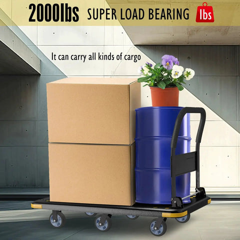 Heavy Duty Foldable Platform Cart With Six Wheels And 2000 Pound Capacity loaded with boxes, drum, and plant in warehouse