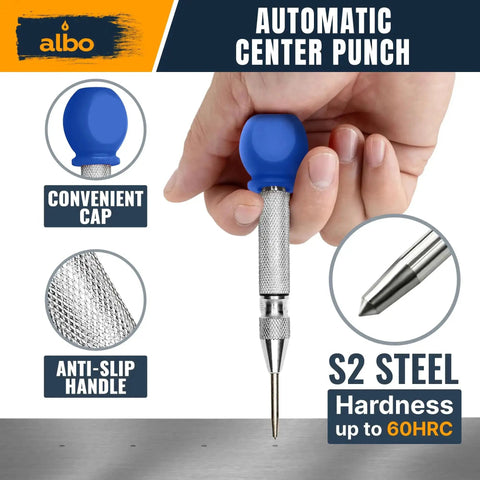 Hand holding an automatic center punch with blue cap, anti-slip handle, made of S2 steel, part of Automatic Center Punch Set With Three Heavy Duty Spring Loaded Punch Tools For Metal Wood And Steel With Precision Tips Galvanized And Blackened Options Storage Box Ideal For DIY Workshop And Pros.