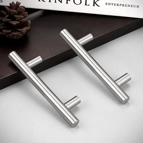 Two brushed nickel Euro T Bar pulls shown on a dark surface, part of 30 Pack 3 Inch Hole Centers Kitchen Cabinet Handles in stainless steel.