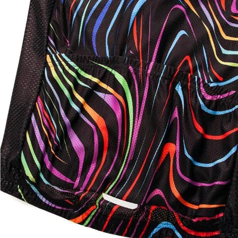 Colorful striped pattern on a black fabric background, close-up view showing vibrant lines in red, blue, green, and yellow.