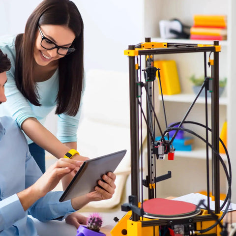Person using tablet next to 3D printer with 31.5 Inch 2020 Aluminum Extrusion T Slot Rail European Standard Anodized Black Linear Rail