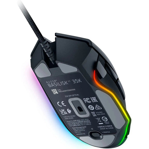 Underside view of Basilisk V3 35K Wired Ergonomic Gaming Mouse With HyperScroll Tilt Wheel, featuring Chroma RGB Lighting and Speedflex Cable.