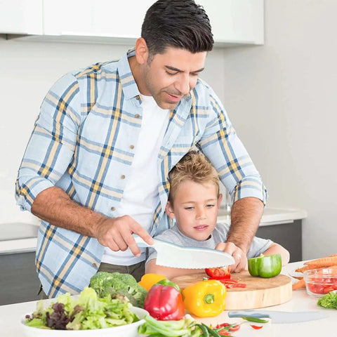 Parent and child using Blue Wooden Kids Knife Set 11 Pieces For Little Chefs Includes Wooden Knife Serrated Toddler Knives