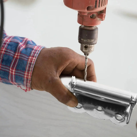 Person installing Three Piece Self Closing Spring Door Hinge Set for Garage Screen Doors made from stainless steel with drill