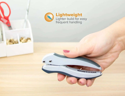 Hand holding lightweight gray and blue stapler on desk, ideal for frequent use and easy handling in home office. Pack Of 5 EZ Squeeze One-Hole Punch Set With 10 Sheet Capacity, Lightweight Gray Blue Desk Side Workhorse, No Jam Tech, Ergonomic Grip, Easy Clean Chip Tray, Handle Lock For Storage, Ideal For Home Office.