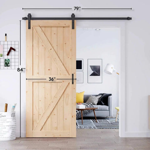 36 Inch By 84 Inch Solid Spruce Sliding Barn Door With A Six Point Six Foot Hardware Kit And Included Handle Installed in Home
