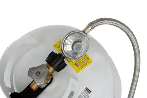 Five-Foot Universal QCC1 Low-Pressure Propane Regulator With Stainless Steel Braided Hose attached to propane tank top view