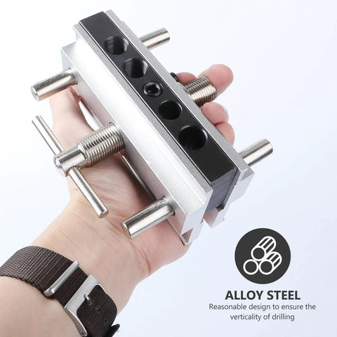 Person holding Self Centering Dowel Drilling Locator Jig With Six Hardened Steel Bushings In One Quarter Five Sixteenths And Three Eighths Inch Precise Wood Doweling Drill Guide For DIY Woodworking Projects And Cabinet Assembly.