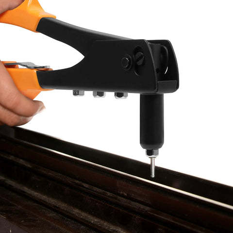 Heavy Duty Hand Rivet Gun Kit With Four Rivet Sizes 3/32 In 1/8 In 5/32 In And 3/16 In Includes 100 Rivets And Four Replaceable Heads Durable Metal Construction For Metal Plastic And Leather Easy Squeeze Handle For Fast Secure Riveting in use on a metal surface