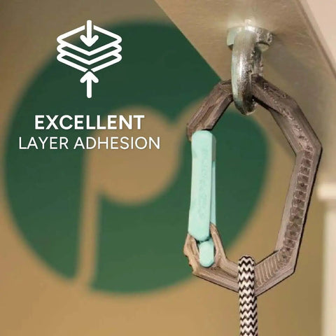 Premium PLA Pro 3D Printing Filament exhibiting excellent layer adhesion on a hook with hexagonal design, green background logo.