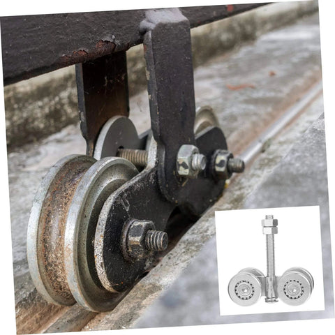 Close-up of heavy duty sliding door track roller and gate wheel for smooth replacement in industrial doors on rail.