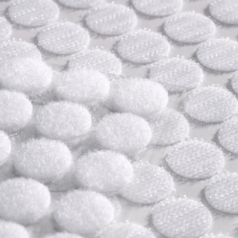Close-up of Adhesive Hook and Loop Dots 0.59 Inch White 1000 Pcs 500 Pairs Arts and Crafts on adhesive backing