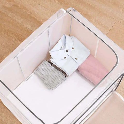 Huge 80L Foldable Storage Bins Organizer With Metal Frame And Durable Handles Clear And Gray 3 Pack For Clothes Bedding Toys And More Waterproof Stackable Tote Boxes With No Assembly Needed showing clothes neatly inside