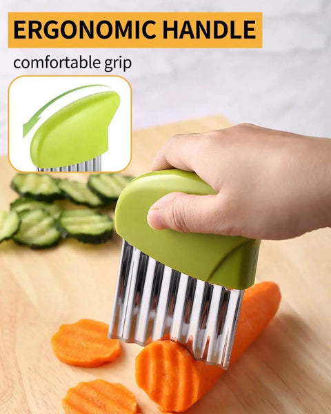Hand using Crinkle Cutter For Potatoes And Veggies Stainless Steel 430 Anti Rust Wavy Knife on carrot slices, ergonomic grip visible.