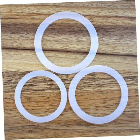 5 Pack Silicone Sealing Rings Replacement Gaskets For Coffee Pot Lids Espresso Pots And Canning Jars on wooden surface