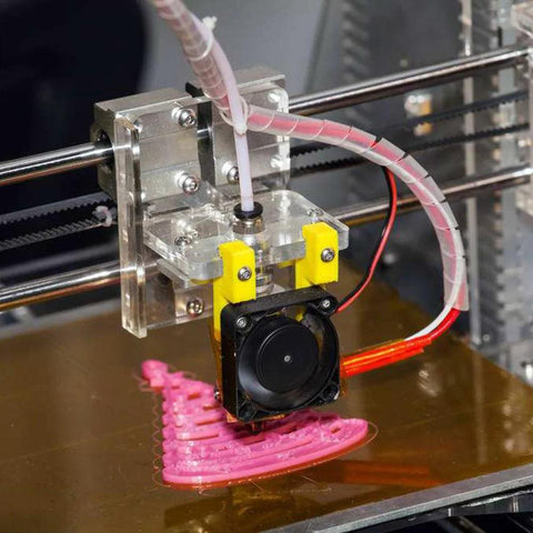 SIQUK PTFE tubing with PC4-M6/M10 fittings on a 3D printer extruder, pink printed part on build plate