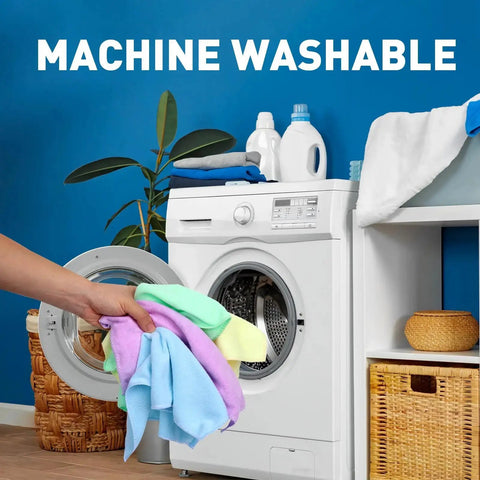 Person loading assorted colors of Bulk 400 Pack Microfiber Towels for Cars and Home 12x12 Inches into washing machine.