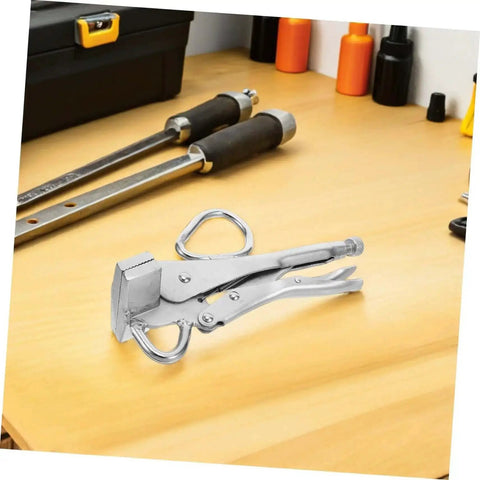 Adjustable Auto Body Sheet Metal Clamp Pliers with Beefy Wide Flat Duckbill Jaws on workbench for vehicle repair