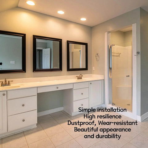 Modern bathroom with double vanity and mirrors, showcasing cabinet doors with silicone hole plugs installed for a seamless look.