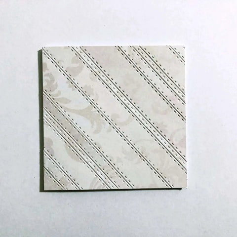Embossed design on cardstock using 4 Piece Rectangle Frame Die Cut Set With Dotted Stitched Borders For Scrapbooking, Card Making