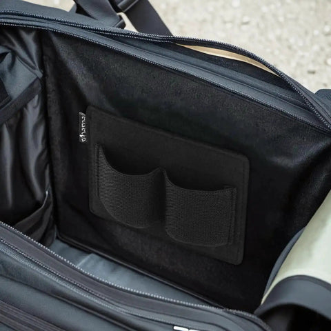 Close-up of Dual Insert Pouch Elastic Holster Set in backpack, showcasing modular two clip tactical panel for quick access gear.