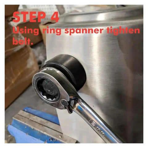 22mm And 20mm Hole Punch Kit With Knockout Die And Punch Set in use on metal surface with ring spanner tightening bolt.