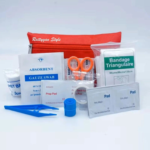 Grab-And-Go Compact Travel First Aid Kit With 95 Piece Emergency Set featuring bandages, gauze, and scissors in a red pouch.