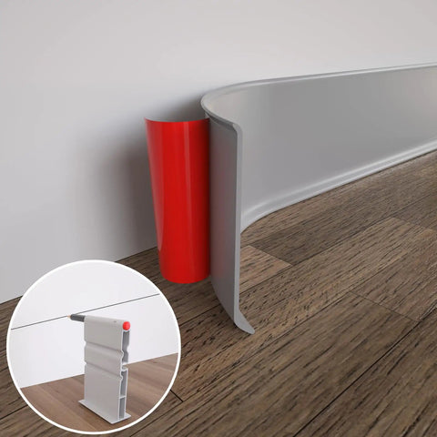 Flexible Baseboard Molding Trim 4 Inch By 20 Feet Self Adhesive Vinyl Wall Base Cove Base Peel And Stick Gray S100 close-up view installed with red backing.
