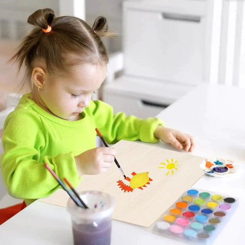 Child painting on 12 Pack Basswood Sheets 12x8 Inch 0.1 Inch Thick for Crafts Laser Cutting Wood Burning and Drawing Projects.