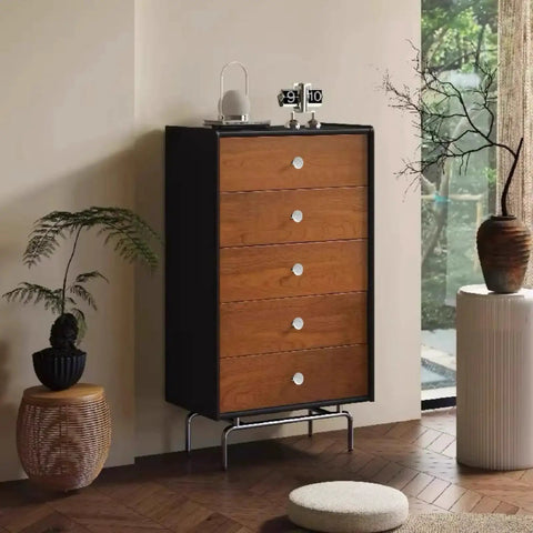 A wooden dresser with white knobs in a room with ceramic decor, showcasing 8 Piece Antique Bronze Ceramic Dresser Handles Set For Cabinets And Drawers.