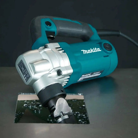 Low Noise 10 Gauge Metal Nibbler With Lock On Trigger cutting metal sheet, 7.4 lb tool, rubber grip, built-in thickness gauge visible