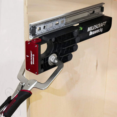 Ultimate Cabinet Jig Bundle For DIYers with drawer slide jig installed on wooden cabinet demonstrating use.