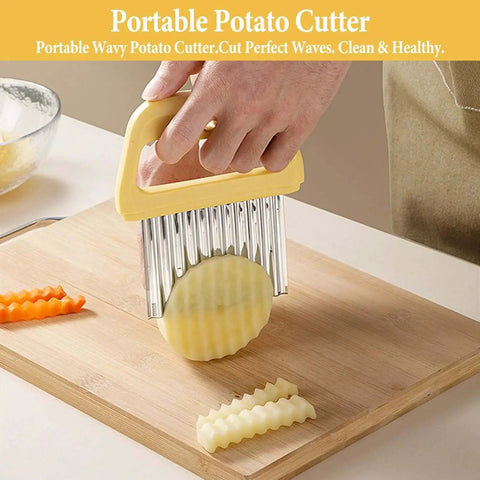 Crinkle French Fry Cutter Wave Slicer For Potatoes Portable Stainless Steel Cutter With Large Wide Blade shown slicing potato on cutting board.