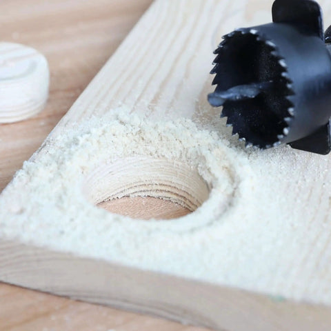 Close-up of All In One Hole Saw Kit With 23 Pieces From Three Quarter Inch To Six Inch For Soft Wood Plastic PVC Drywall in use