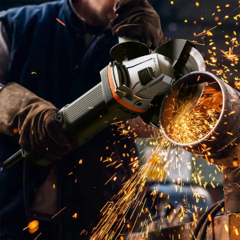 Person using angle grinder to cut metal pipe, sparks flying, showcasing Grinder Flange Wrench And Lock Nut Kit For 4.5 to 5 Inch Angle Grinders.