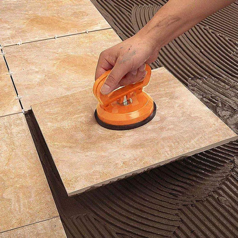 Heavy Duty Glass Vacuum Lifter With 5 Inch Suction Cup Power Grip lifting a tile during installation process