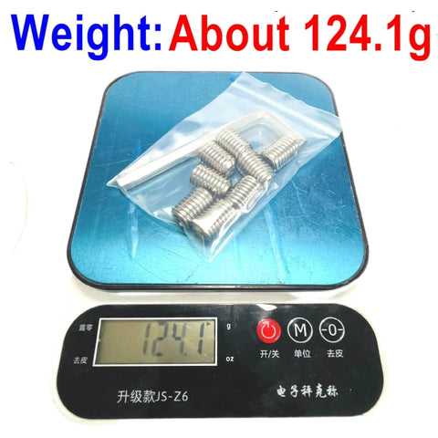 Eight Piece 1/2-13 by 3/4 Inch Hex Socket Set Screws 304 Stainless Steel Allen Head Grub Screws on scale, 124.1g weight.