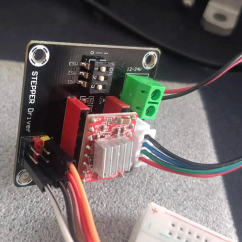 Close-up of Two Pack 42 Stepper Motor Driver Expansion Boards For 3D Printers DRV8825 A4988 Compatible Shield Module on grey surface