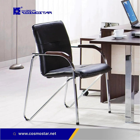 Office chair next to a desk, showcasing Cosmostar furniture in a modern workspace.