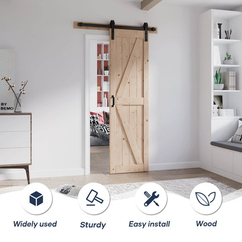 24 Inch By 84 Inch Sliding Barn Door With Hardware Kit Included Four Foot Solid Spruce Panel K Shape Wood Door For No Fuss DIY Assembly Rustic Farmhouse Style Interior Room Divider installed in a modern room.