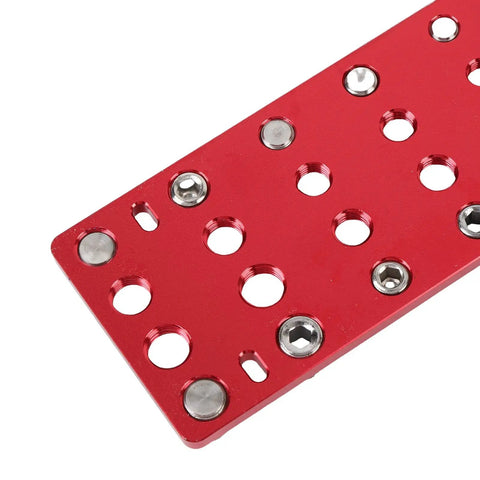 Close-up of Nut And Bolt Thread Checker Set With 28 Hole Metal Gauge For Metric And Standard Threads in red color.