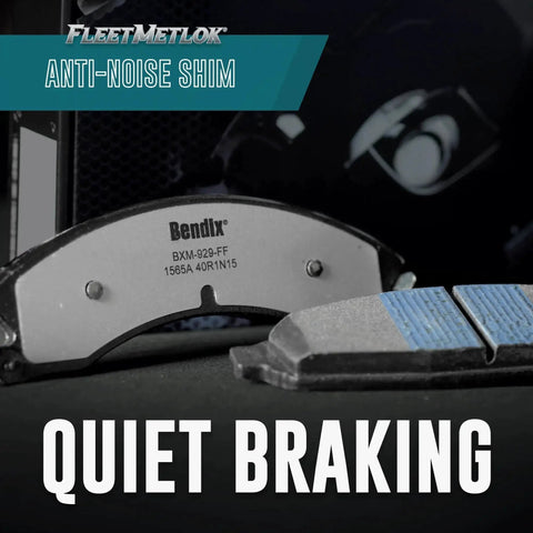 Bendix front brake pad with anti-noise shim, close-up view