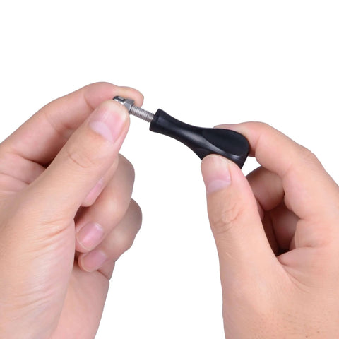 Person holding a short screw from the 3 Long Thumb Screws And 1 Short Screw Kit For GoPro Hero 13 Through 3 Plus Hero Session And Max.
